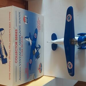 Amoco vintage  airplane bank 1/32 scale die cast metal .New limited edition